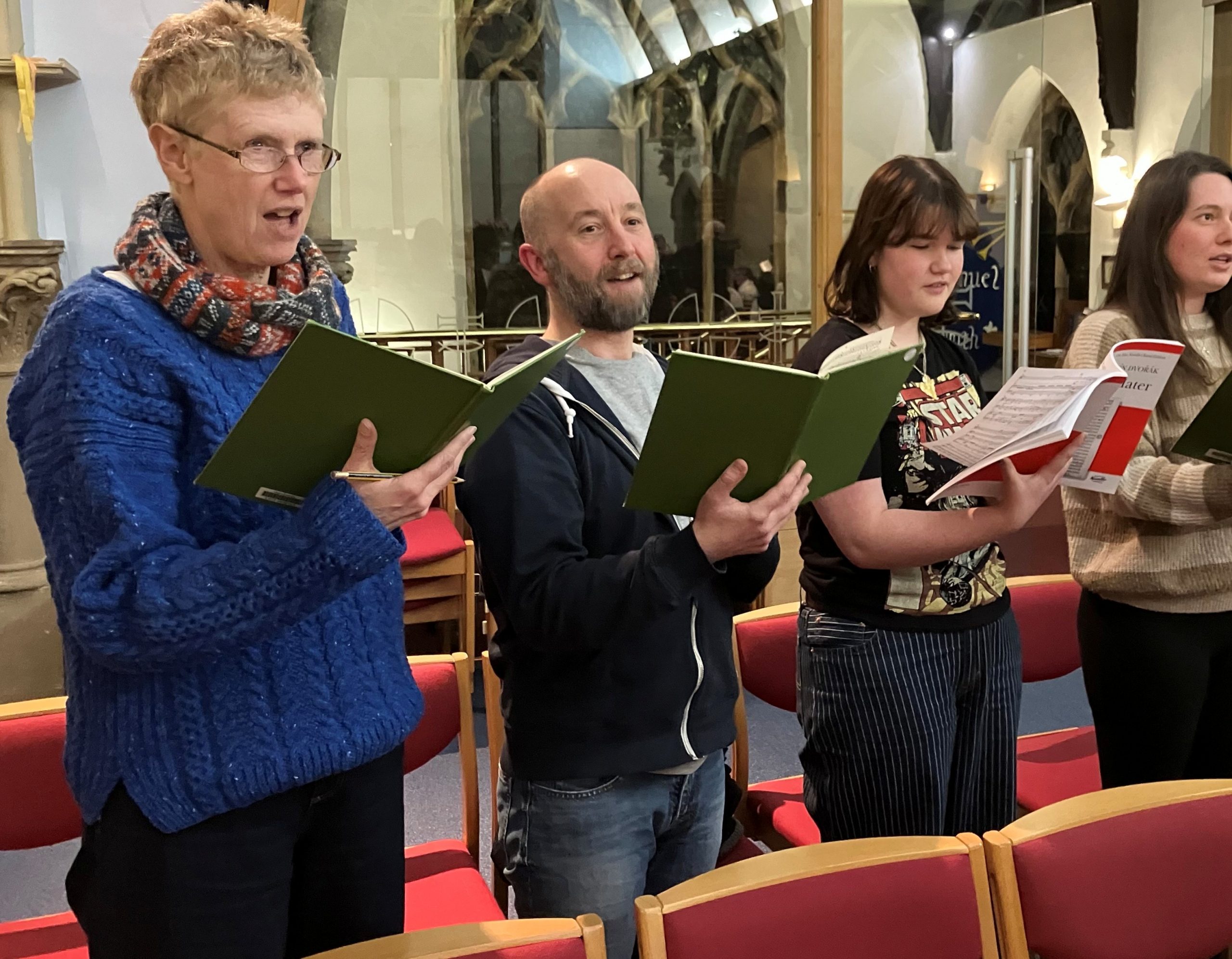 Four adults singing